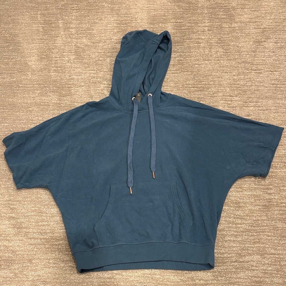 Sweaty Betty short sleeve hoodie. Size medium. Blue.